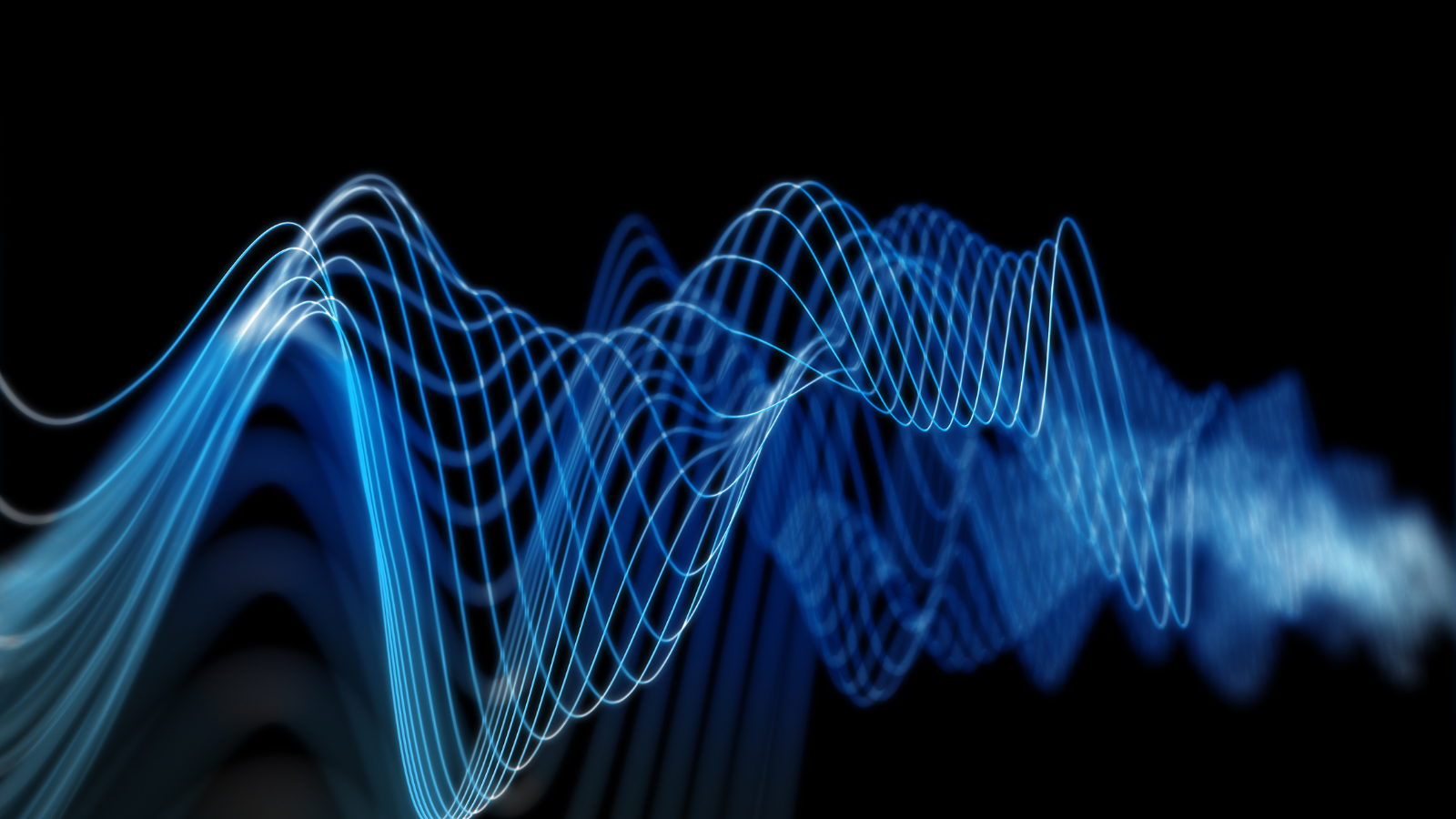Abstract digital image of intertwining blue and white waveforms set against a black background. The waveforms create a dynamic, flowing pattern, resembling sound waves or energy signals. - CSA Catapult