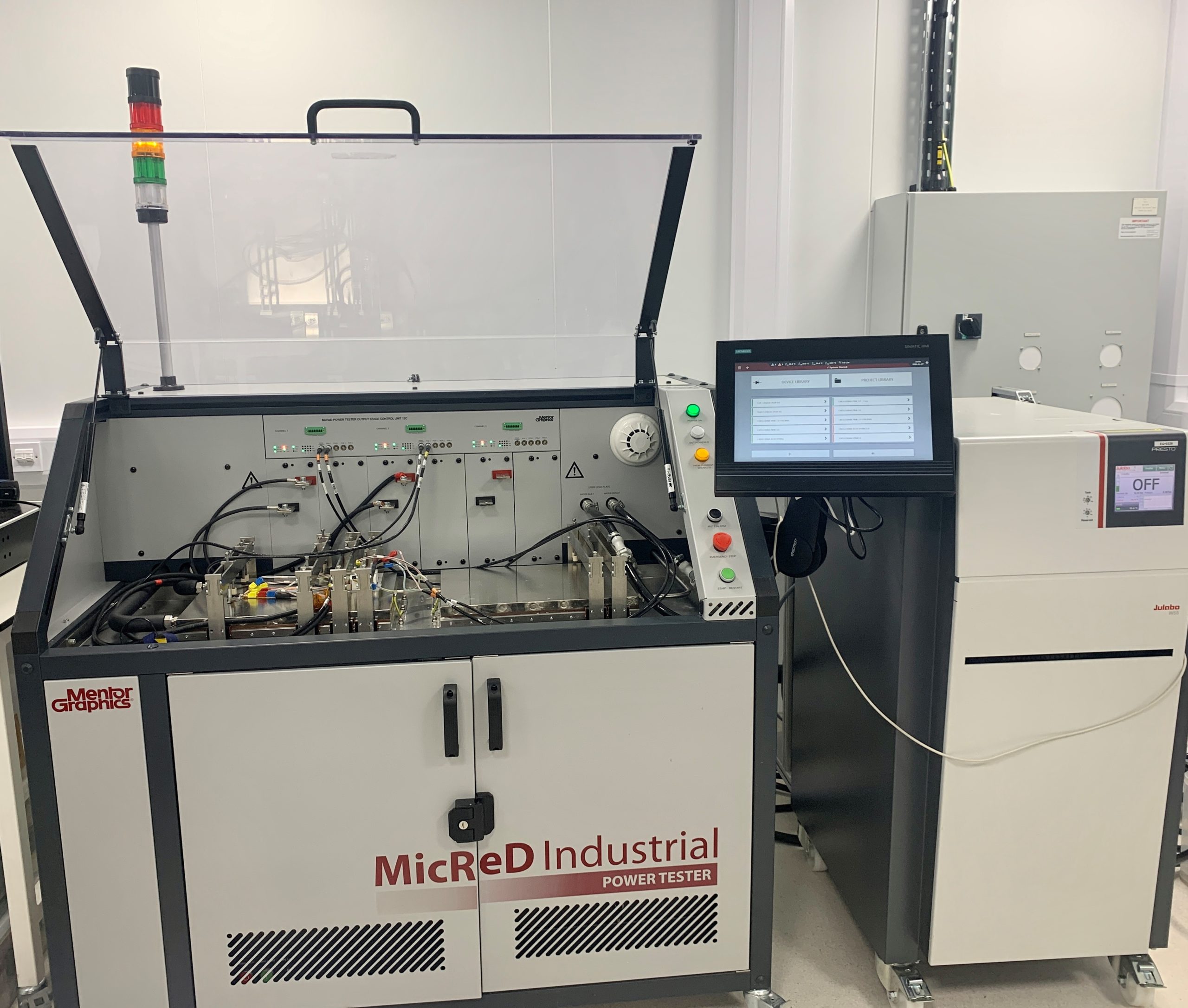 A MicReD Industrial Power Tester with control panel, GaN device, and monitor in a laboratory setting. - CSA Catapult