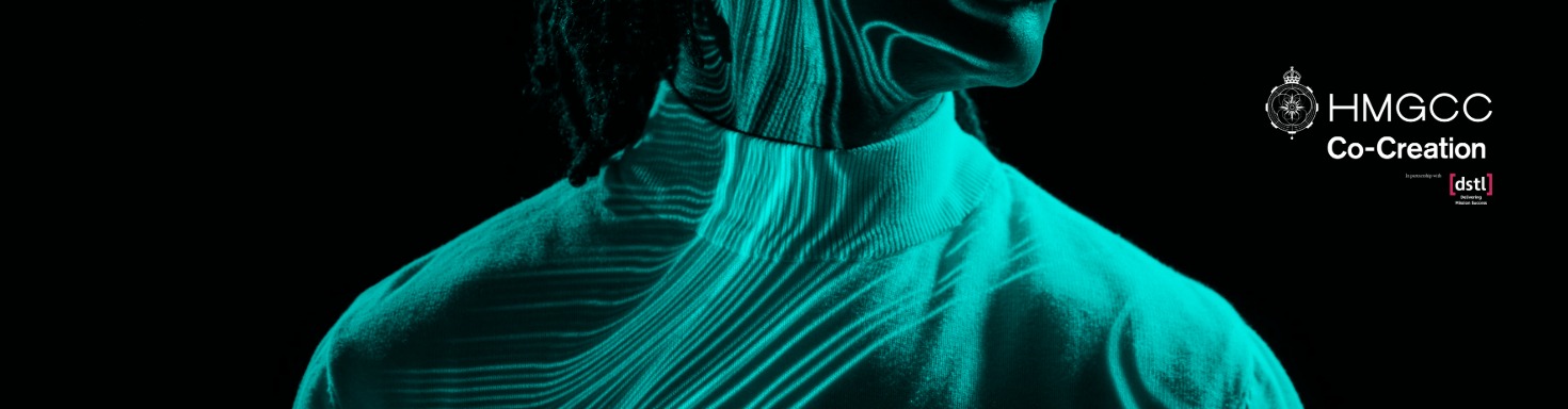 Person in a teal, glowing, futuristic outfit with 